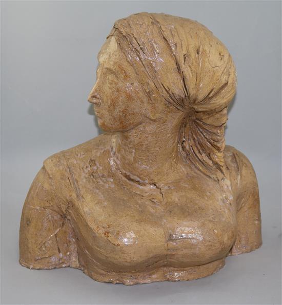 Quentin Bell (1910-1996). A terracotta bust of a woman wearing a headscarf,